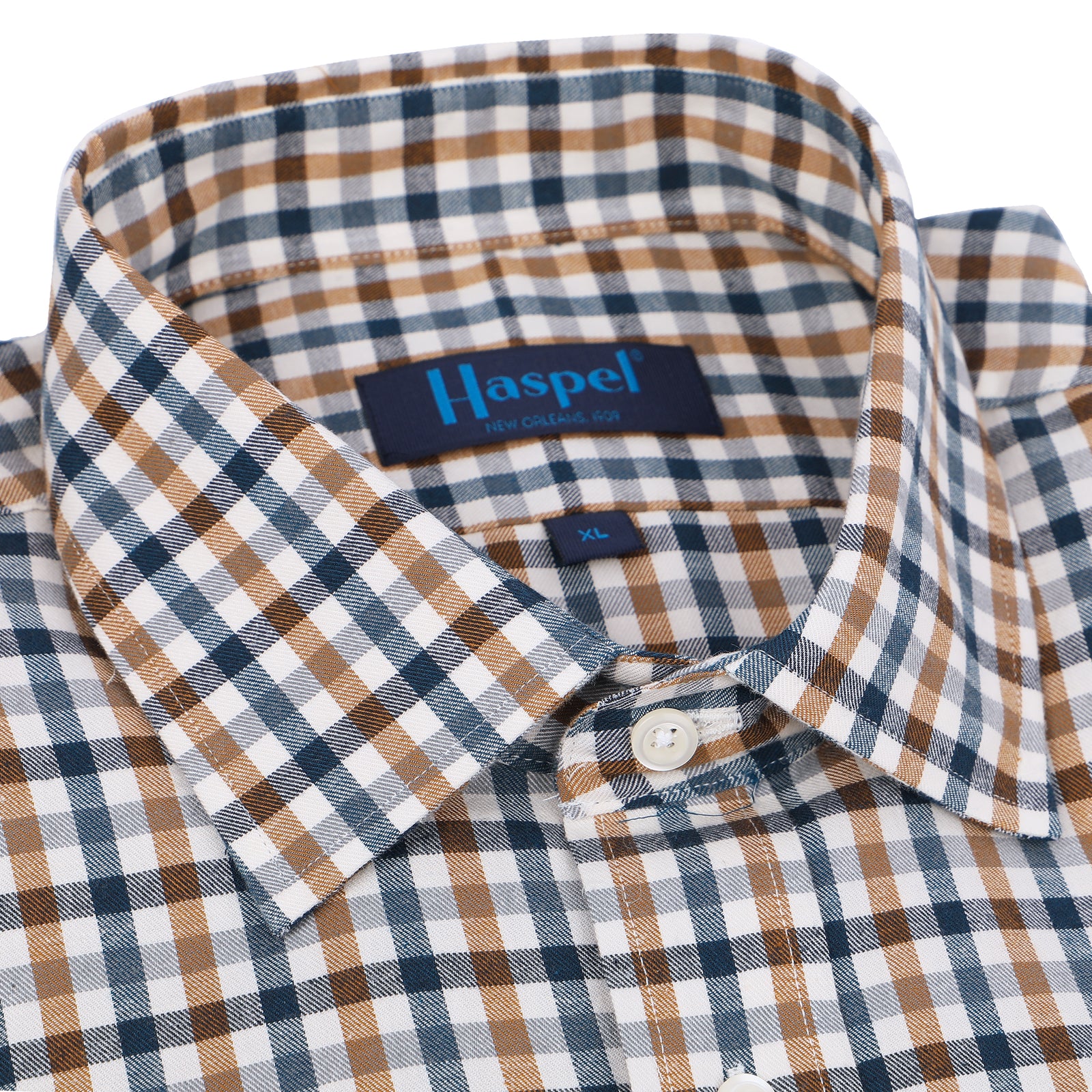 Deep navy & caramel check will keep you looking fresh all season long. Brushed cotton for a supremely soft, lightweight feel.  100% Cotton • Long Sleeve • Spread Collar • Chest Pocket • Classic Fit 