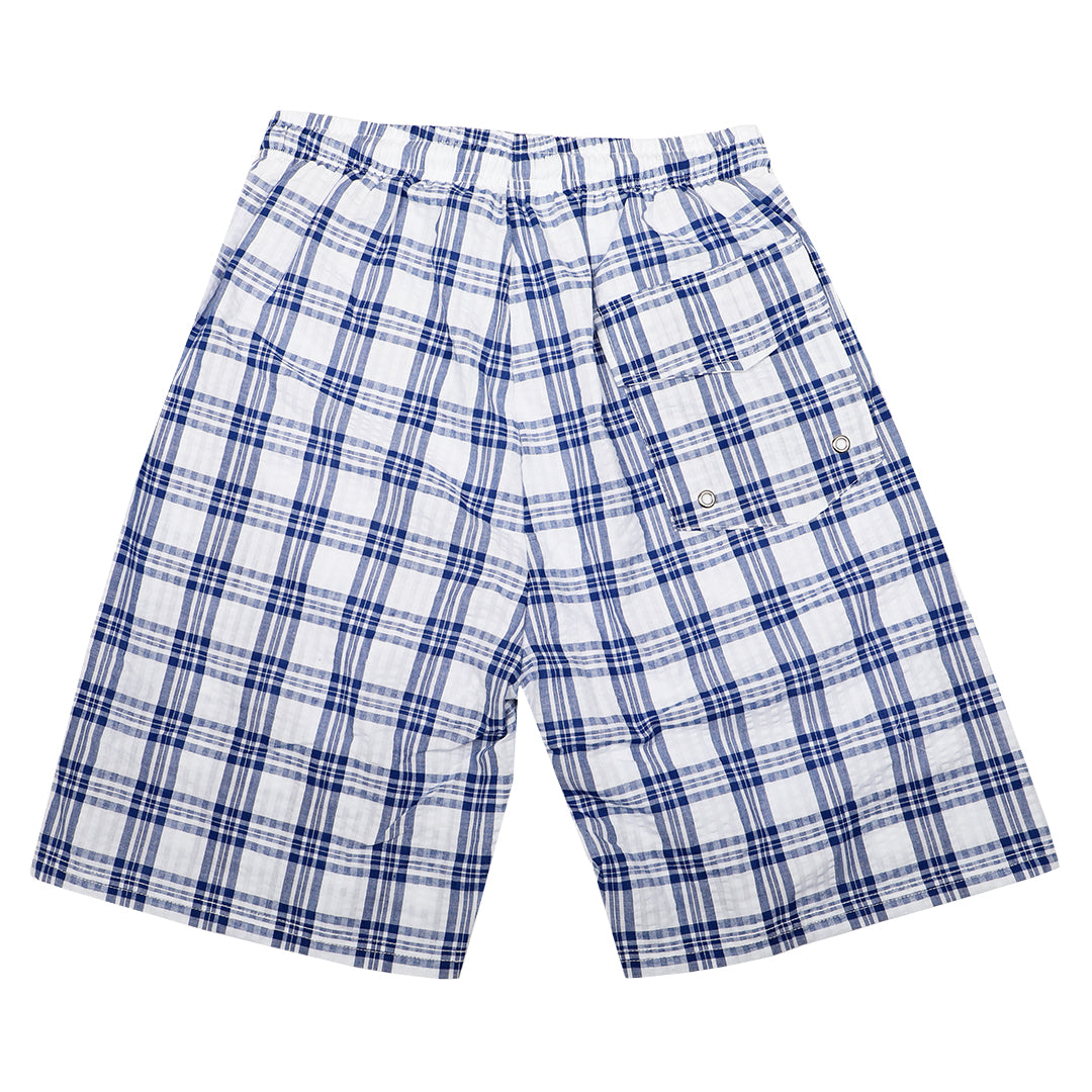 Seersucker swim shorts for your best summer yet. No uncomfortable netting here. Only the best compression lining and the best cooling cotton seersucker. Available in three classic patterns.   100% Cotton Seersucker  •  9&quot; Inseam  •  White Compression Lining  •  Tipped Drawstring  •  2 Front Pockets  •  1 Velcro Back Flap Pocket with Drain Holes  •  1 Inside Waistband Pocket  •  Machine Wash  •  Imported Return Policy