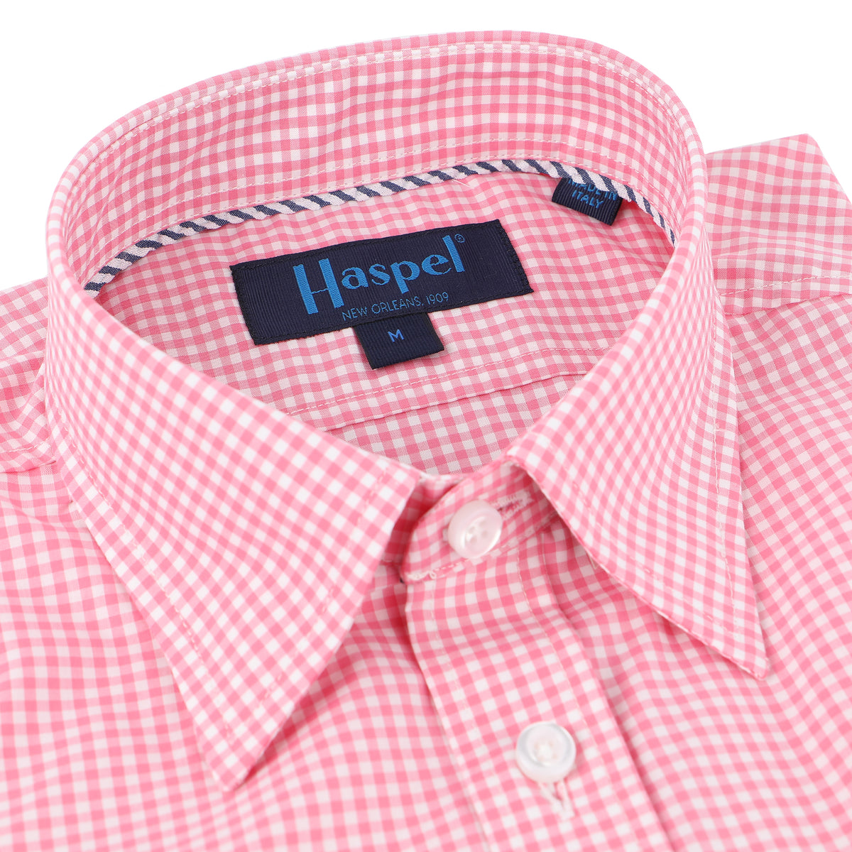 Pink gingham and the luxury of 100% Italian made cotton canvas is the look that checks all the boxes.  100% Cotton • Hidden Button Collar • Long Sleeve • Chest Pocket • Machine Washable • Made in Italy