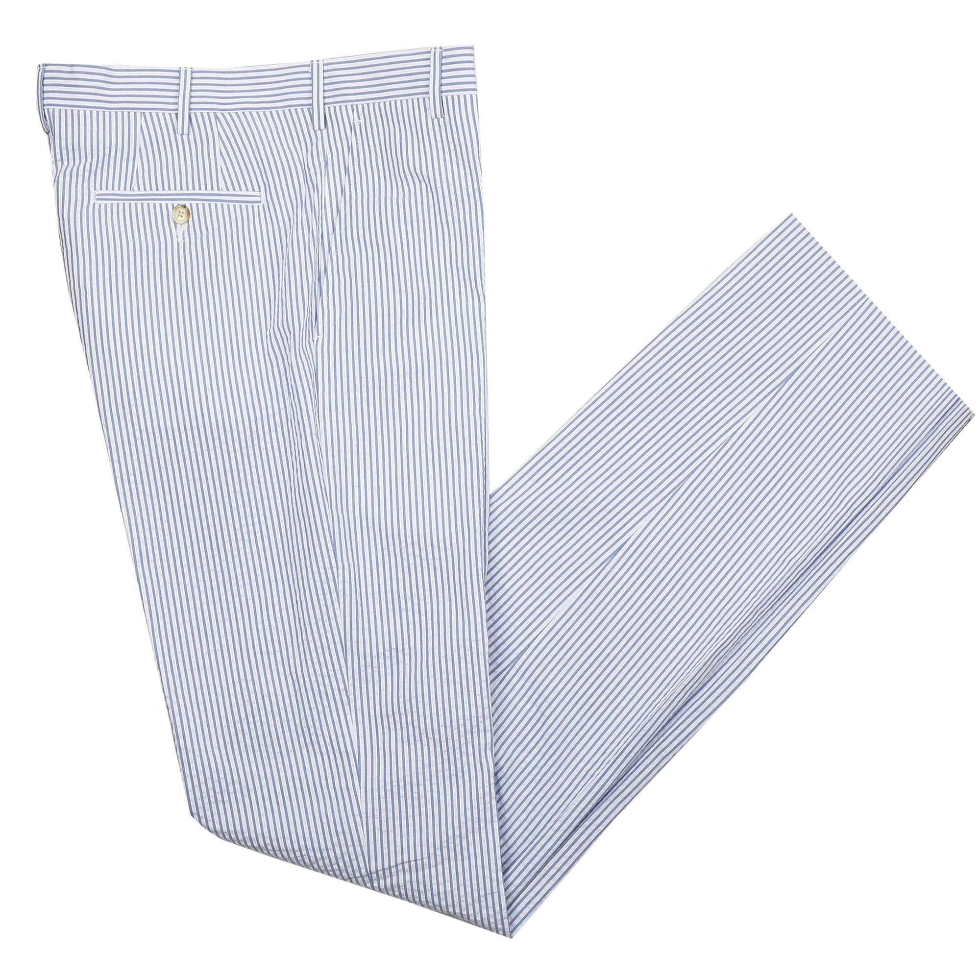 Experience the breezy, classic charm of our Algiers Navy / White Seersucker Pant. These stunning New Orleans-inspired trousers are perfect for your next summer outing. Cut from lightweight seersucker fabric, they combine timeless Tan and White stripes with a relaxed fit for unbeatable comfort and style. Try them this season for a look that radiates effortless elegance!  100% Cotton Seersucker • Algiers Fit • Flat Front • Tab Button Closure • Unfinished Bottom (37.5") • Dry Clean • Imported