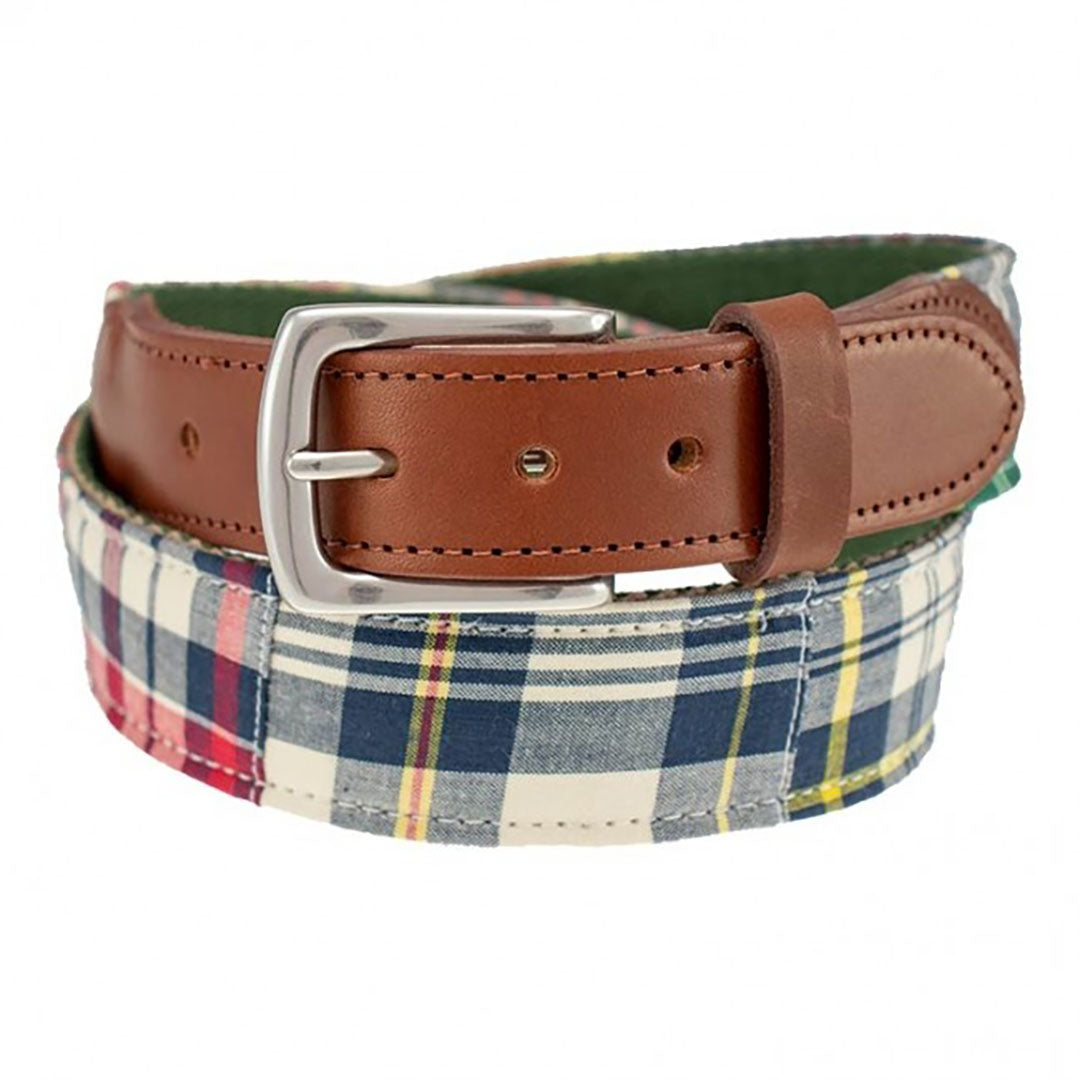 Our Haspel x T.B. Phelps collaboration belt is a stylish addition to any summer wardrobe, features genuine madras fabric in vivid summer colors. Perfect for your summer trip to the Vineyard or the Islands! The madras is backed on sturdy nylon webbing, finished with a sturdy briar tab set and nickel finish buckle.