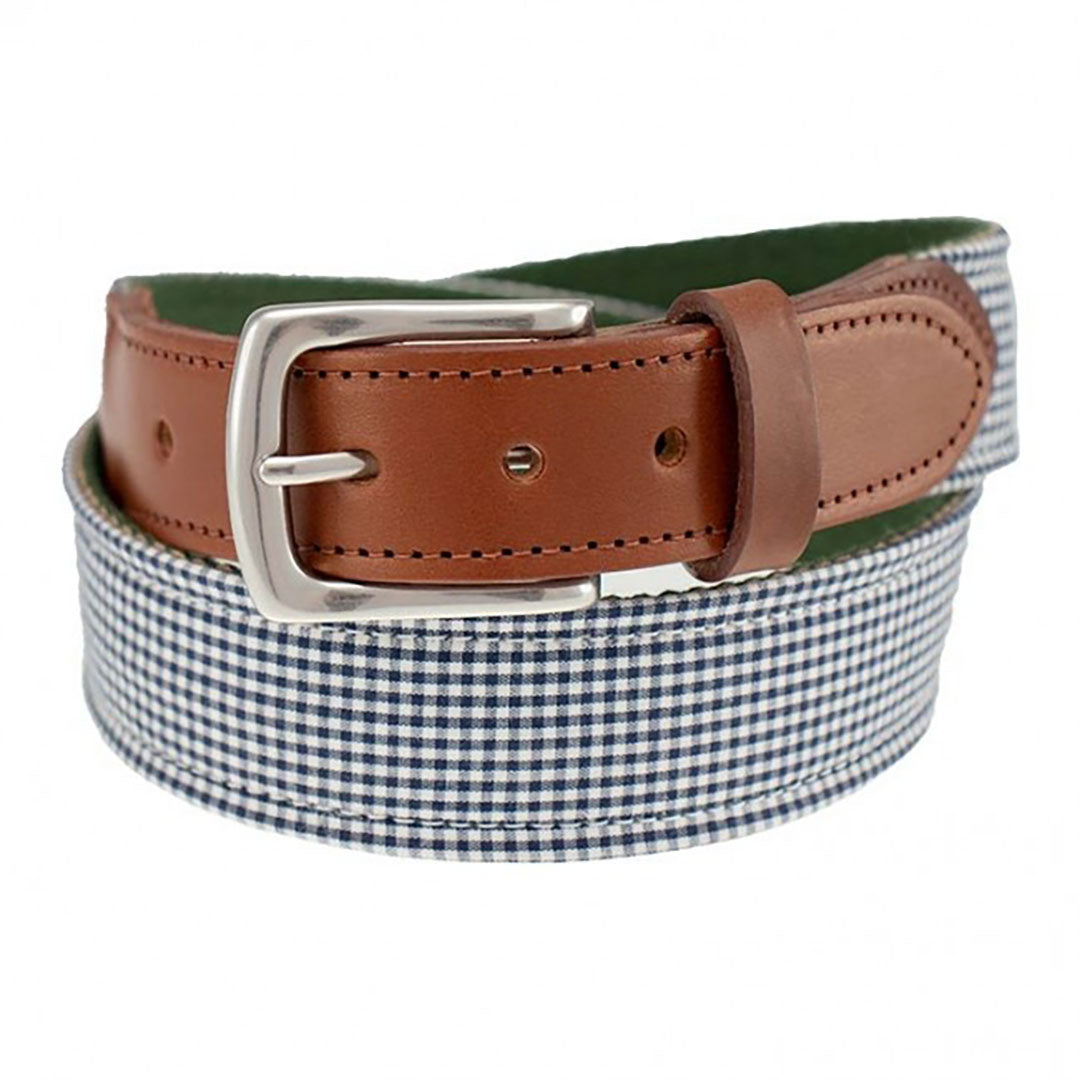 Our Haspel x T.B. Phelps collaboration belt is a stylish addition to any summer wardrobe, features navy gingham fabric. Perfect for your summer trip! The navy gingham is backed on sturdy nylon webbing, finished with a sturdy briar tab set and nickel finish buckle.