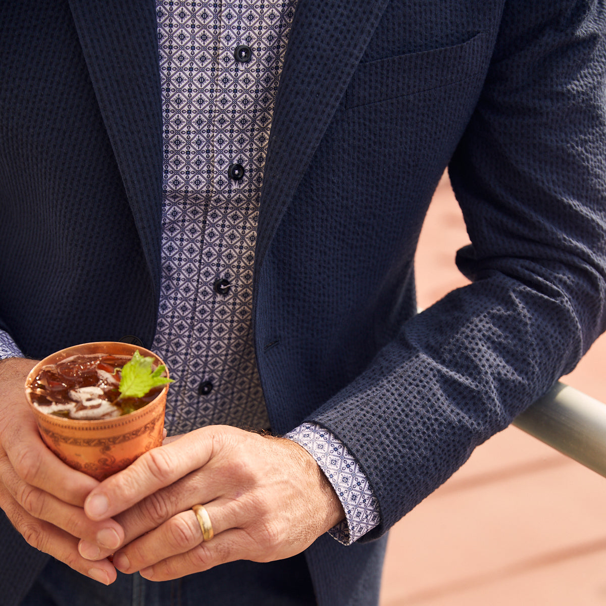 A nod to one of our favorite New Orleans cocktails, spiced with the warmth of cognac. Navy spiced up with the worlds best seersucker pucker. Always cool.   97% Cotton / 3% Lycra Haspel Exclusive Seersucker Stretch Fabric  •  Maximized Seersucker Pucker  •  Audubon Classic Fit  •  Natural Shoulder  •  Two Buttons  •  Flap Pockets  •  3/4 Lined for Maximum Cool  •  Side Vents  •  Notch Lapel  •  Dry Clean  •  Made in USA